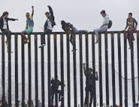 ImmigrantsOVerfence